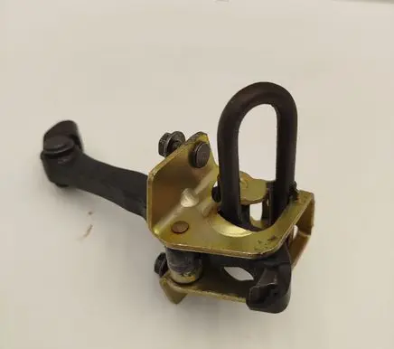 Front door check strap stopper