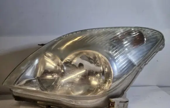 Toyota Corolla Verso E121 Headlight/headlamp 9922079004