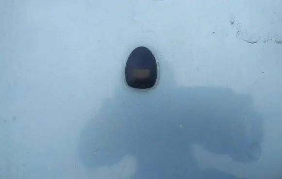 Windshield washer spray nozzle