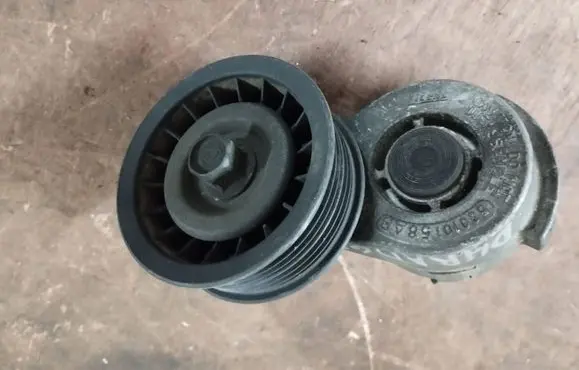 Dodge Durango I Alternator belt tensioner 53010158AB