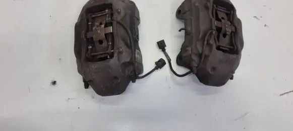 Volkswagen Touareg II Front brake caliper 7P6615105AE 7P6615106AE