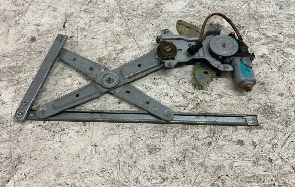 KIA Carens I Front door window regulator motor XH004P0