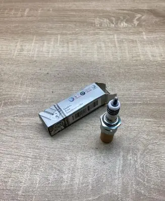 Volkswagen Caddy Spark plug 101000036AA