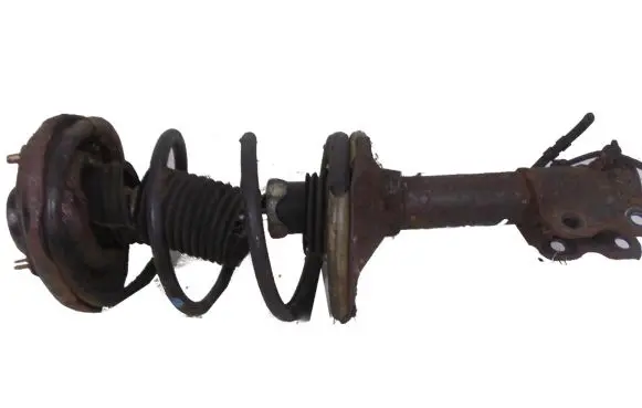 Nissan Maxima Front shock absorber with coil spring