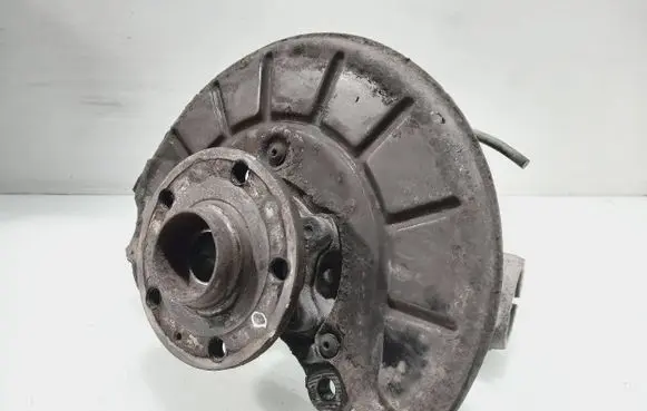 Volkswagen Touran I Front wheel hub spindle knuckle 1k0611