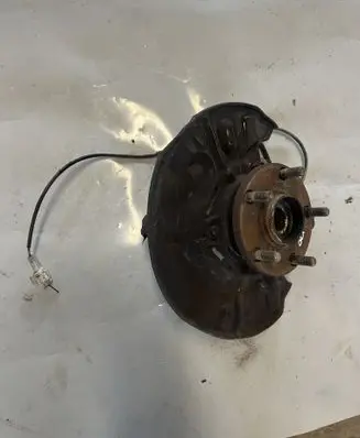 Front wheel hub spindle knuckle