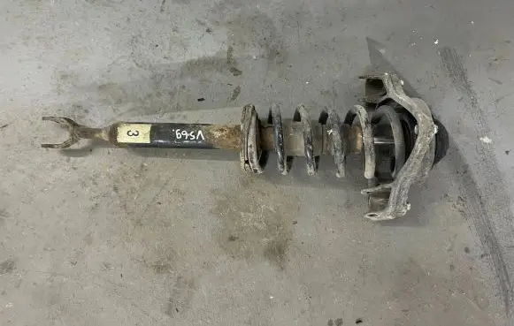 Audi A6 S6 C6 4F Front shock absorber with coil spring