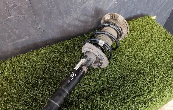 Front shock absorber with coil spring