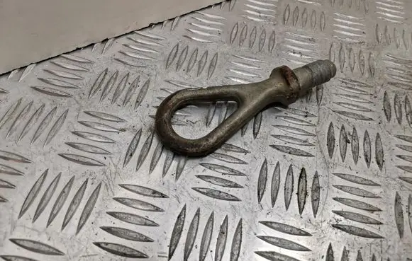 Towing hook eye