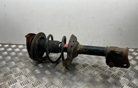 Subaru Outback Front shock absorber with coil spring 334375