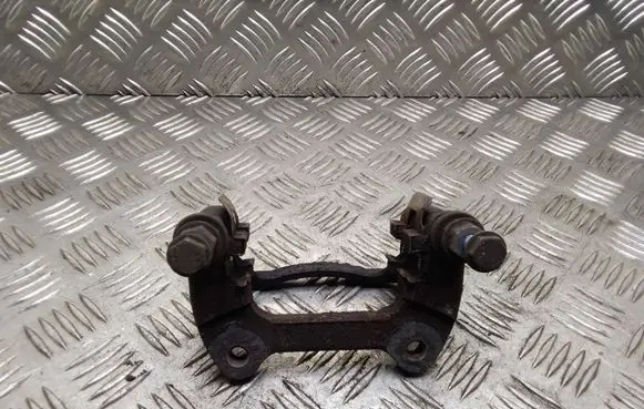Mini One - Cooper Coupe R56 Brake caliper pad carrier rear 
