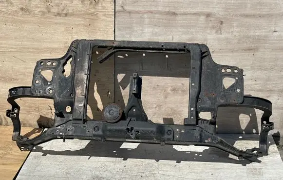 Radiator support slam panel