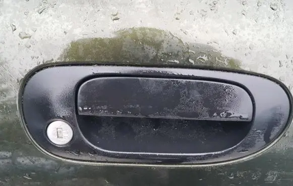 Mitsubishi Carisma Front door exterior handle