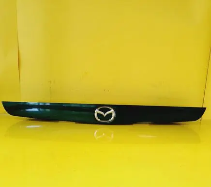 Mazda 626 Trunk door license plate light bar GG3E50810