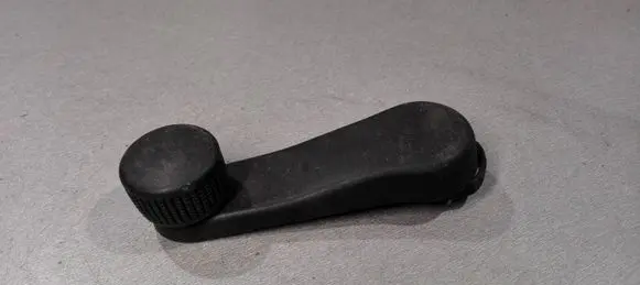 Volkswagen Golf IV Rear door window winding handle 1H0837581D