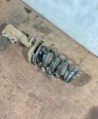 Opel Astra J Front shock absorber with coil spring 13354032