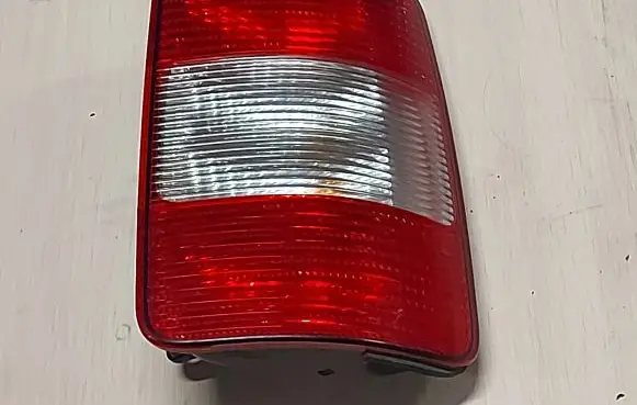 Volkswagen Caddy Rear/tail lights 2K0945112A