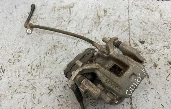 Toyota Camry VIII XV70 Rear brake caliper