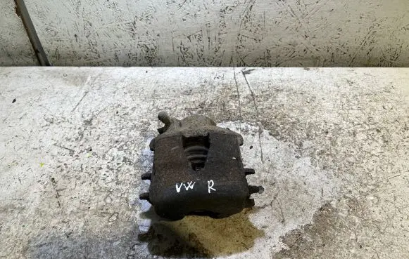 Volkswagen Golf V Front brake caliper
