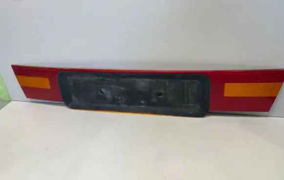 Trunk door license plate light bar