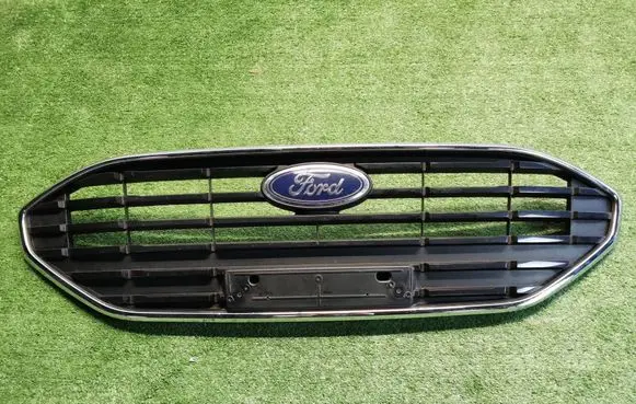 Ford Focus Front bumper upper radiator grill NX7B-8200-AB