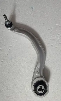 Tesla Model Y Front lower control arm/wishbone 104435900A