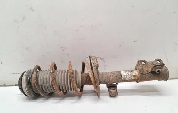 Opel Corsa D Front shock absorber with coil spring 13214852