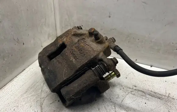 Nissan Primera Front brake caliper 259571