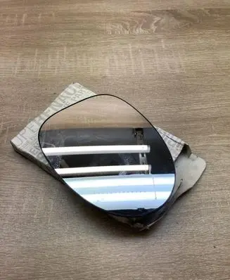 Renault Twingo I Wing mirror glass 7701049083