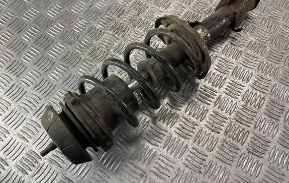Opel Combo C Front shock absorber with coil spring 22194807 24403439 463016733