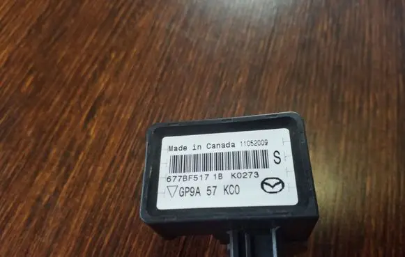 Mazda CX-7 Airbag deployment crash/impact sensor GP9A57KC0 677BF5171BK0273 11052009