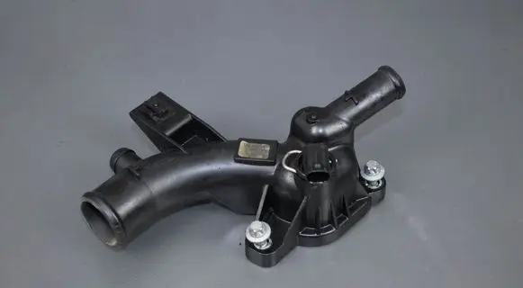 Thermostat/thermostat housing