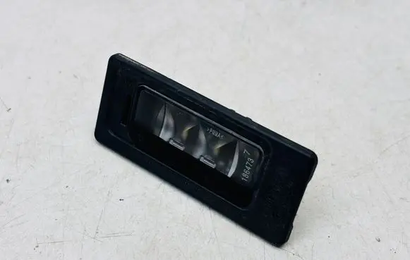Volkswagen Touran II Number plate light 3AF943021A