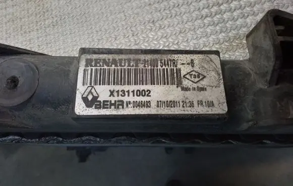 Opel Movano B Coolant radiator 95529411 214107641R