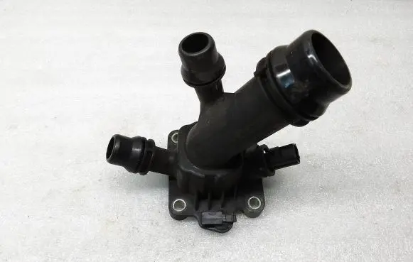 Thermostat/thermostat housing