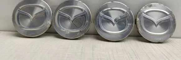 Mazda 626 Original wheel cap GD7F3719X