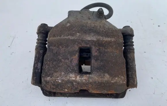 Nissan Almera N16 Front brake caliper