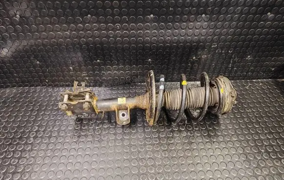 Front shock absorber with coil spring