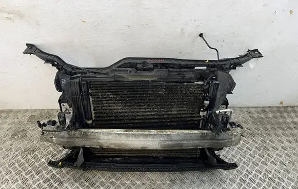 Radiator support slam panel