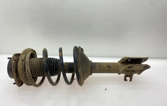 Subaru Forester SF Front shock absorber with coil spring