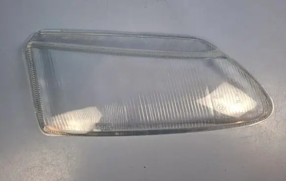 Renault Laguna I Headlight lense 155129165
