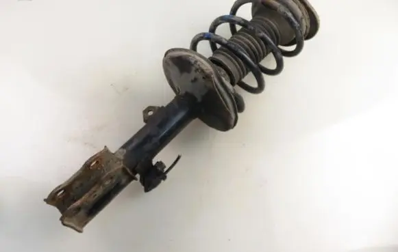 Toyota Corolla E120 E130 Front shock absorber with coil spring 