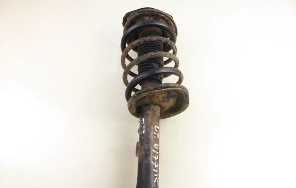 Peugeot Partner Front shock absorber with coil spring