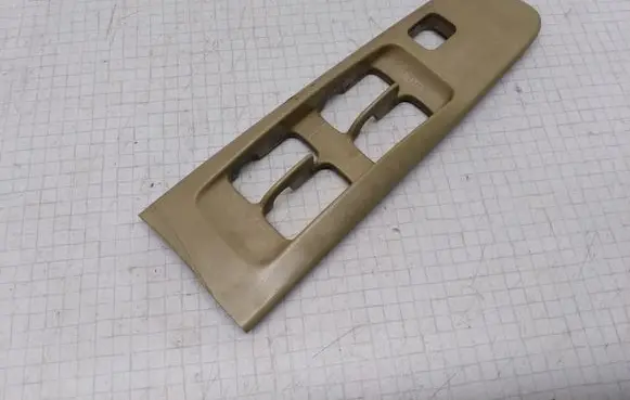 Mitsubishi Galant Front door window switch trim 