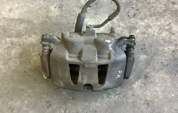 Dodge Grand Caravan Front brake caliper OEM