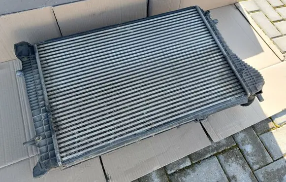 Volkswagen Caddy Intercooler radiator 1K0145803H 1K0121207T