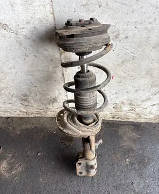 Nissan Micra Front shock absorber with coil spring