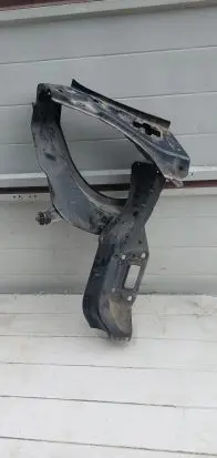 Radiator support slam panel bracket
