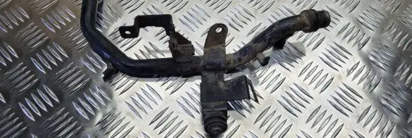 Volkswagen PASSAT B5 Engine coolant pipe/hose 028121065AC