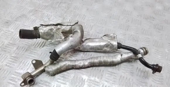 Volkswagen Golf VII Engine coolant pipe/hose 06K121497AD 06K121065R